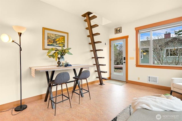 dining area featuring visible vents and baseboards