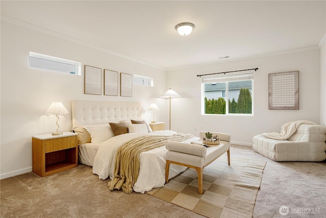 carpeted bedroom featuring baseboards and crown molding