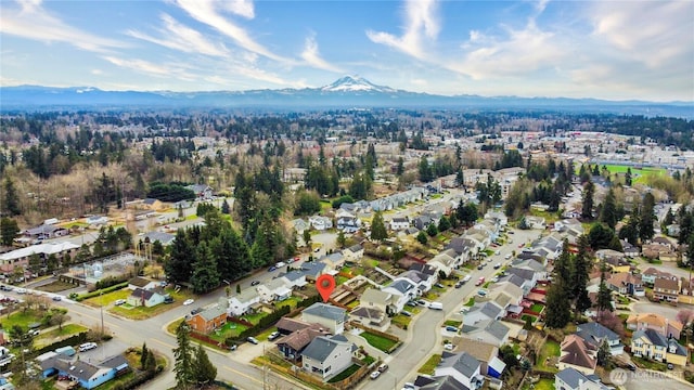 bird's eye view featuring a residential view and a mountain view