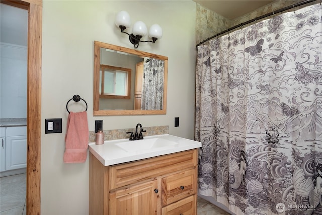 bathroom featuring vanity and a shower with curtain