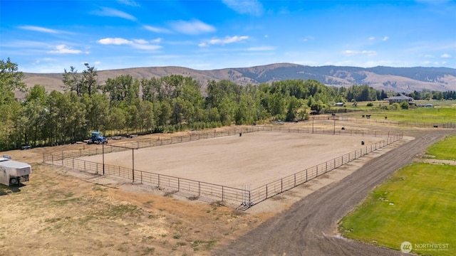 property view of mountains featuring a rural view