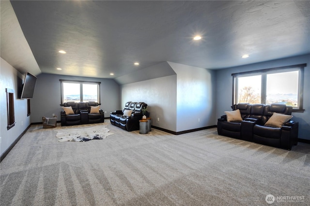 living area with baseboards, lofted ceiling, carpet, and recessed lighting
