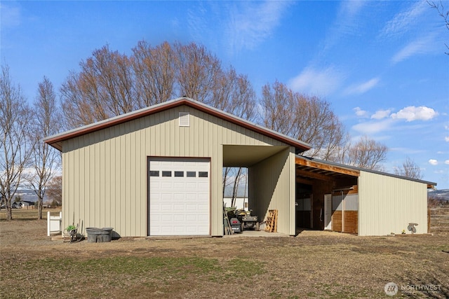 garage with a garage and driveway