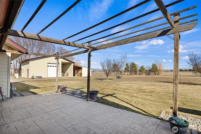 view of patio / terrace featuring fence and a pergola