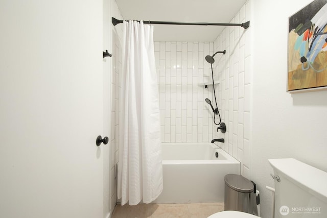 full bathroom with tile patterned floors, toilet, and shower / bath combination with curtain