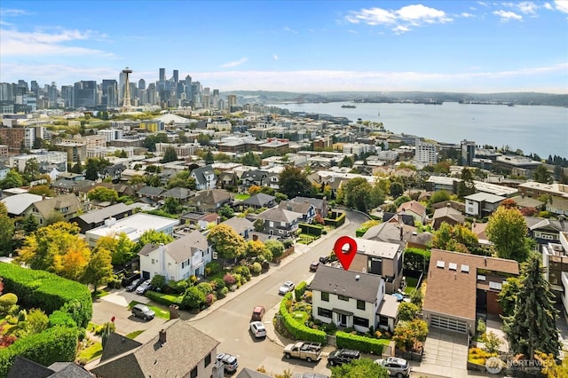 drone / aerial view with a water view and a view of city