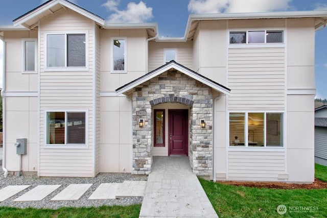 view of front facade featuring stone siding