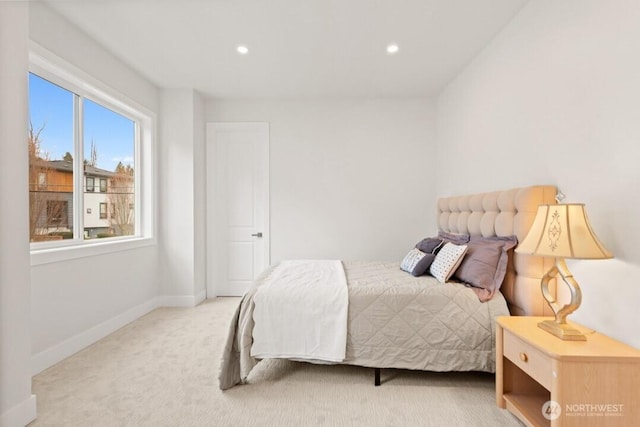 carpeted bedroom with recessed lighting and baseboards