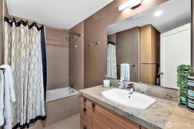 bathroom with vanity and shower / bathtub combination with curtain