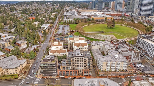 birds eye view of property with a city view