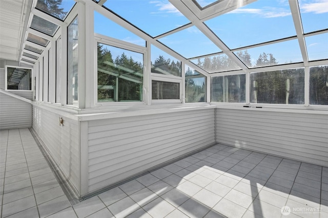 unfurnished sunroom featuring a healthy amount of sunlight