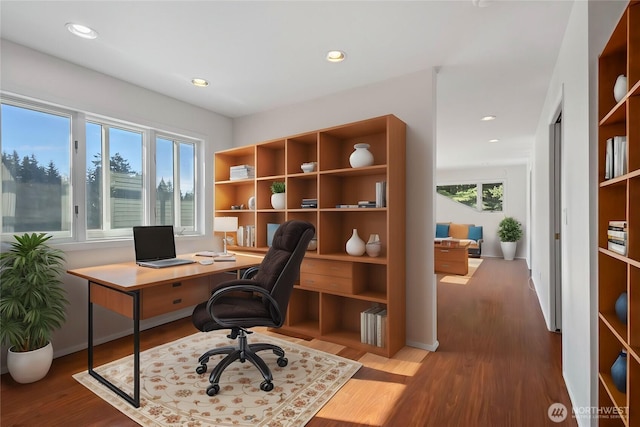 office area featuring recessed lighting, baseboards, and wood finished floors