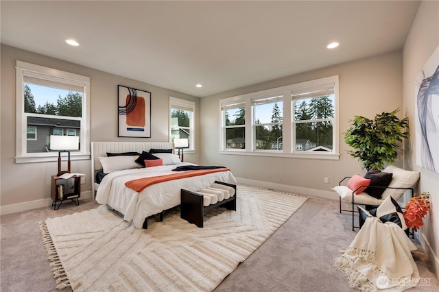 bedroom featuring recessed lighting, baseboards, and carpet floors