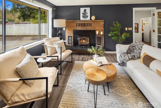 living room featuring wood finished floors and baseboards