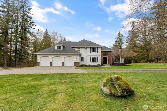 view of front of home with roof with shingles, concrete driveway, a front yard, an attached garage, and brick siding