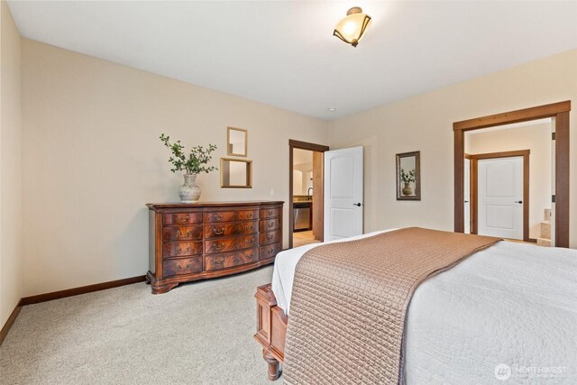 carpeted bedroom with baseboards