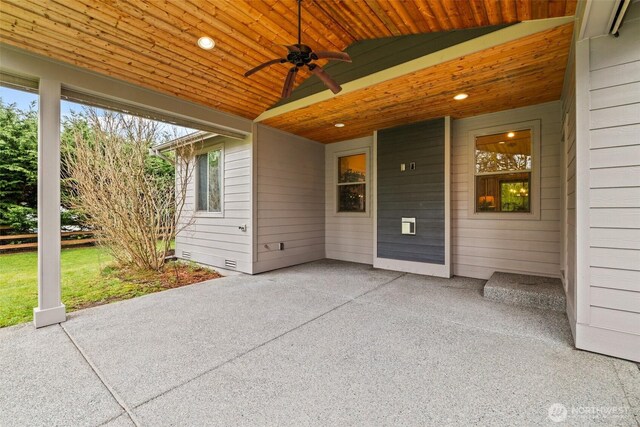 view of patio / terrace featuring ceiling fan and fence