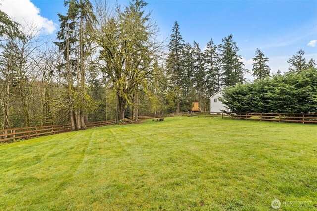 view of yard with fence