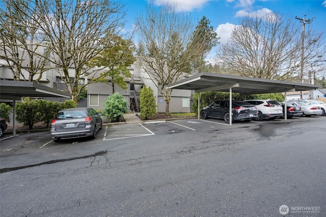 view of partially covered parking lot