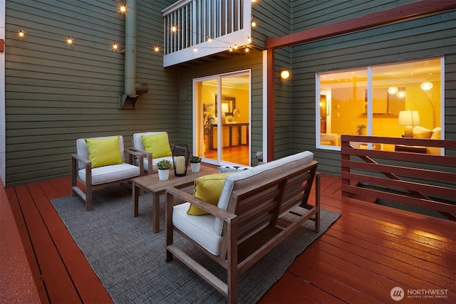 wooden deck featuring an outdoor living space