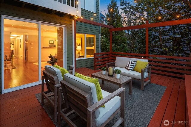 wooden deck featuring an outdoor hangout area