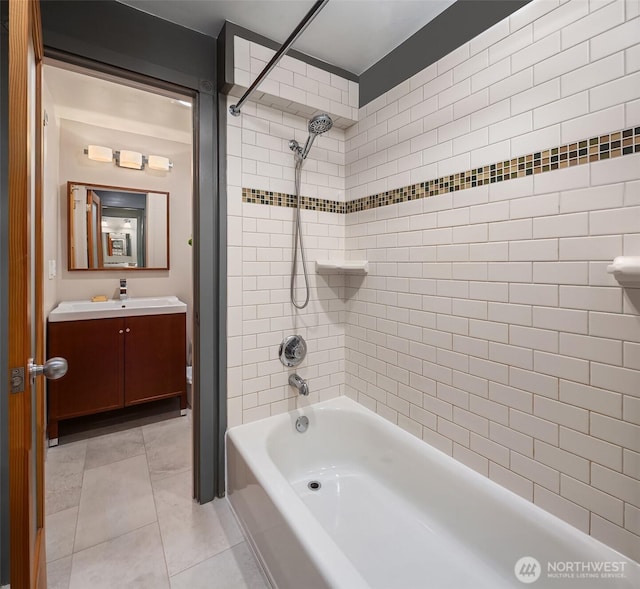 full bathroom featuring tile patterned flooring, tub / shower combination, and vanity