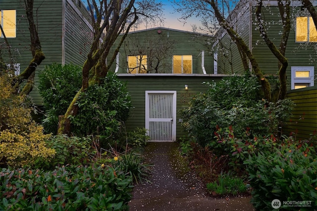 view of property exterior at dusk