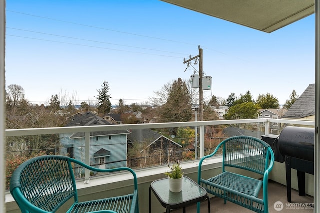 balcony featuring area for grilling