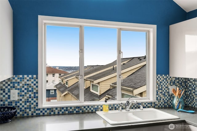 interior space featuring a sink and plenty of natural light