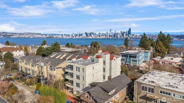 bird's eye view with a view of city and a water view