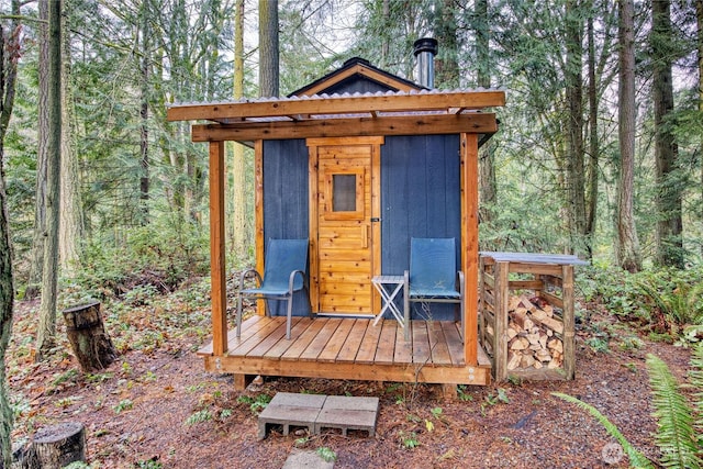 view of outbuilding featuring an outdoor structure