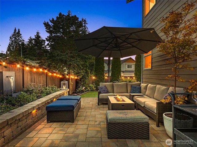 view of patio with outdoor lounge area and fence