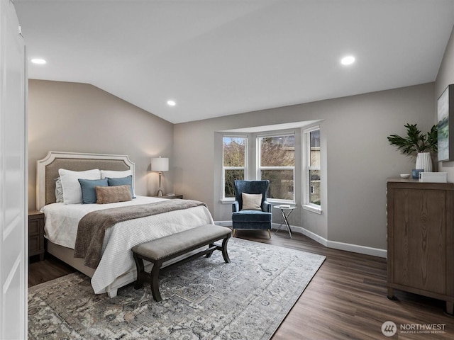 bedroom with recessed lighting, baseboards, wood finished floors, and vaulted ceiling