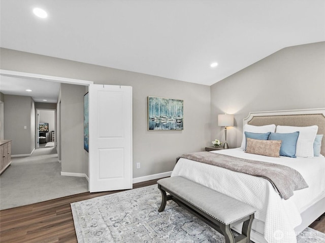 bedroom with recessed lighting, baseboards, and wood finished floors