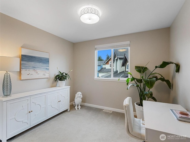 living area featuring light colored carpet, visible vents, and baseboards