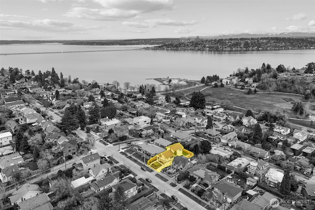 drone / aerial view featuring a water view