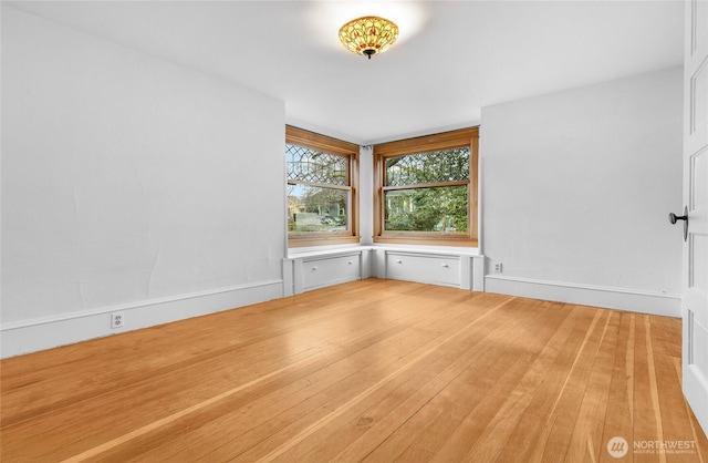 empty room featuring light wood-style flooring