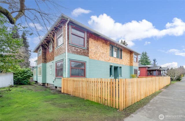 exterior space with a fenced front yard