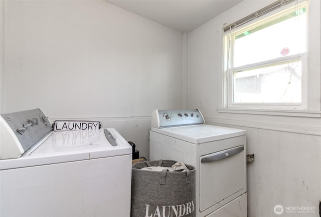 6845 S Clement Ave, Tacoma, WA 98409 - laundry area with washing machine and dryer and healthy amount of natural light