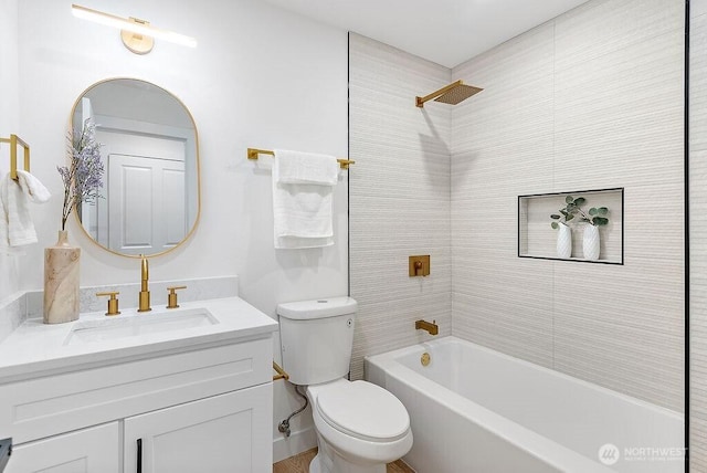 full bathroom featuring vanity, toilet, and tub / shower combination