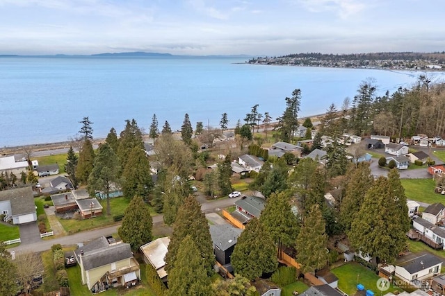 bird's eye view featuring a residential view and a water view