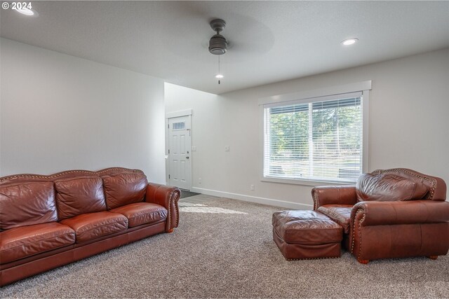 living area featuring recessed lighting, baseboards, carpet, and a ceiling fan