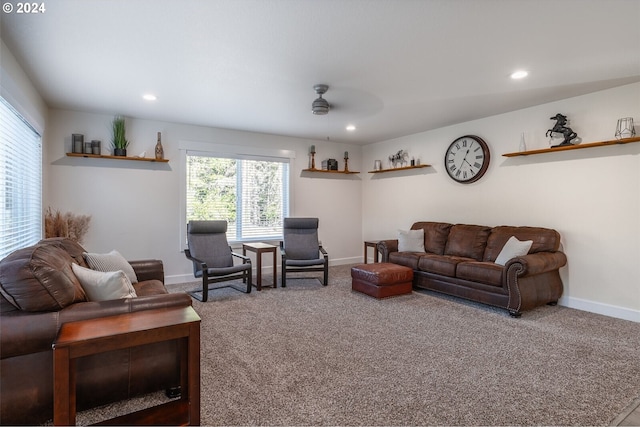 carpeted living area featuring recessed lighting, baseboards, and a ceiling fan