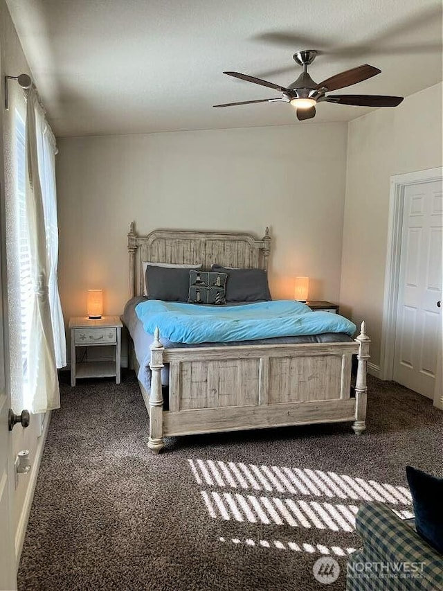 carpeted bedroom with a ceiling fan