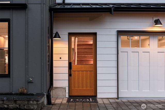 entrance to property with a standing seam roof and metal roof