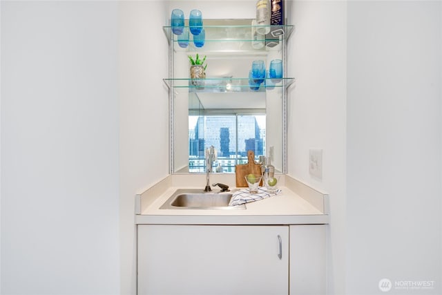 bar featuring a sink and indoor wet bar