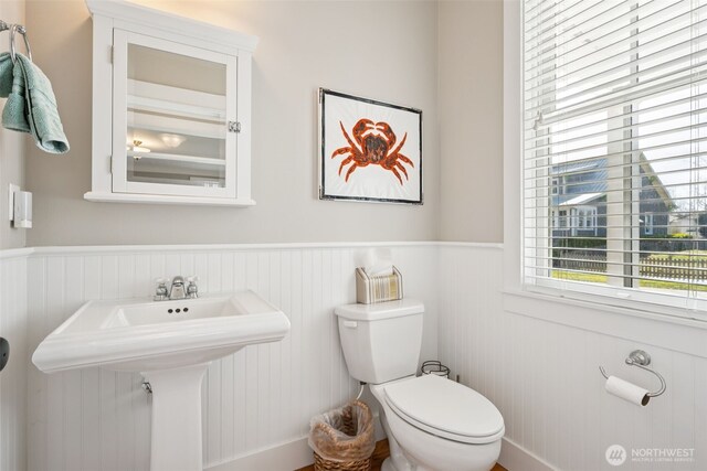 221 Meriweather St, Pacific Beach, WA 98571 - bathroom featuring a sink, toilet, and wainscoting