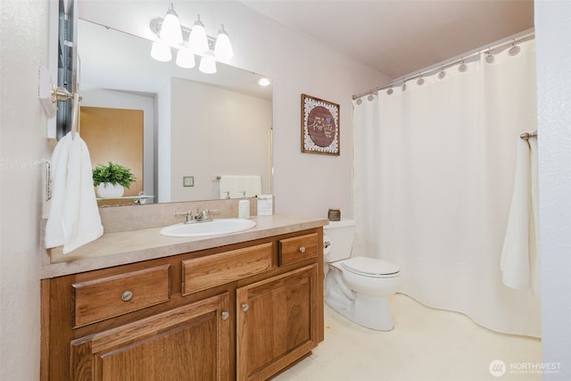 full bath with toilet and vanity