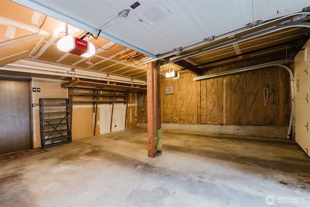 garage featuring a garage door opener