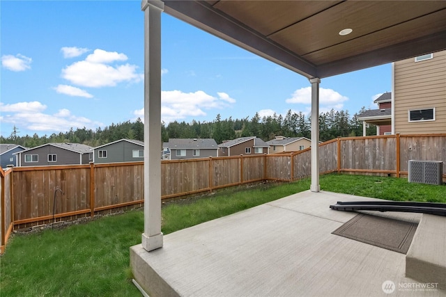 view of patio / terrace featuring a residential view and a fenced backyard